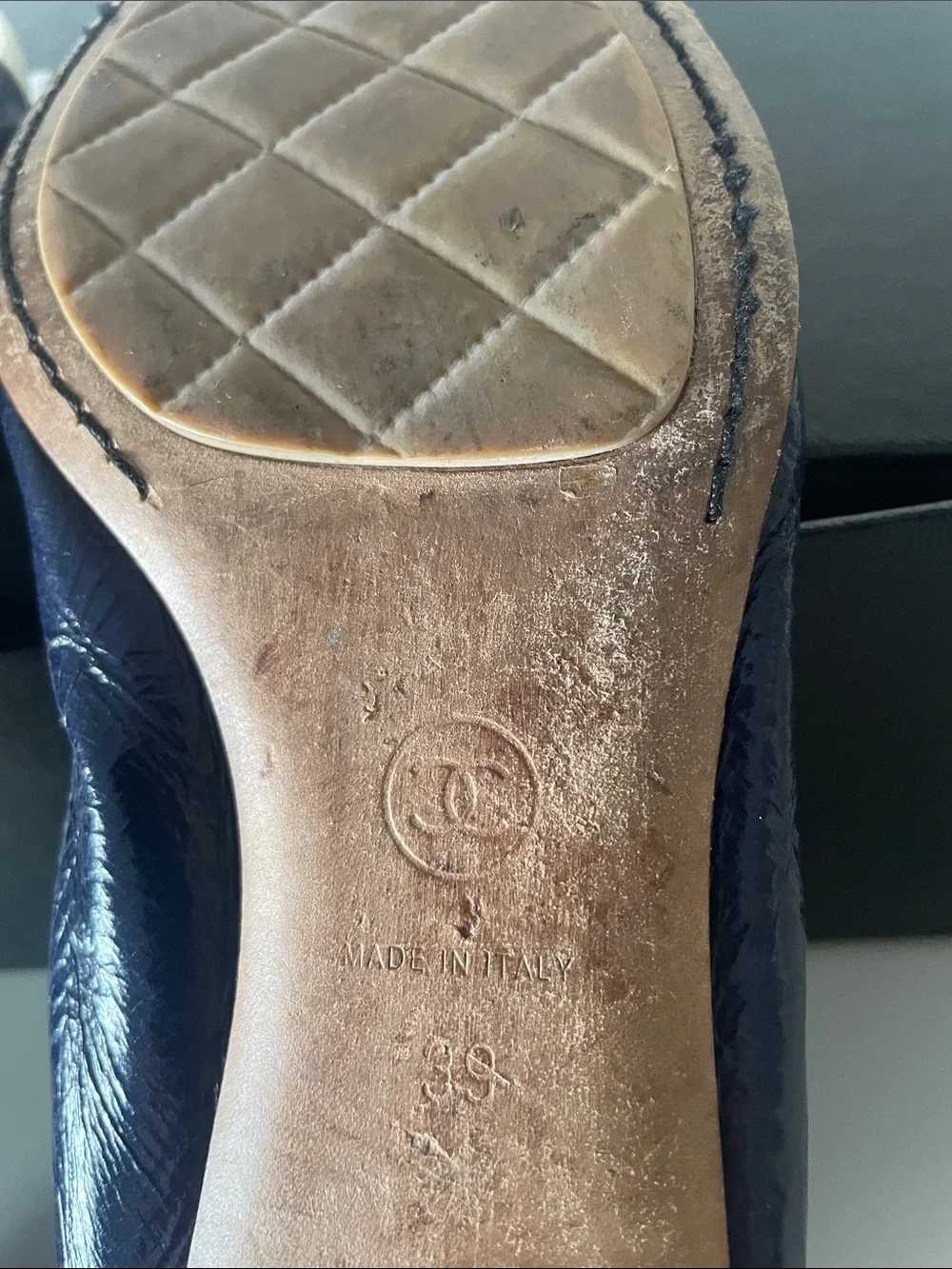 CHANEL Navy and Ivory Quilted Cap-Toe Ballet Flats